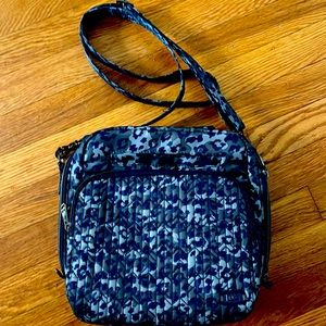 Lug cross body bag. Purchased on QVC and has never been used.